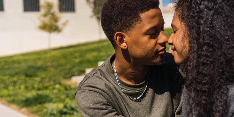 If He Sends These 20 Mixed Signals, He's Not Relationship Material man and woman flirting