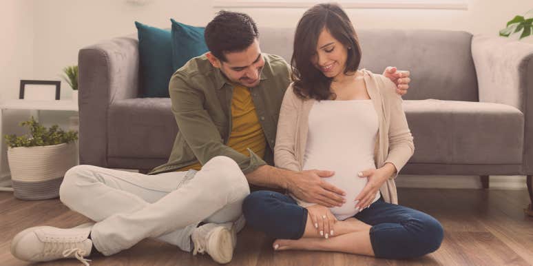 20 Old Wives Tales To Predict Your Baby's Gender man touching the stomach of a pregnant woman
