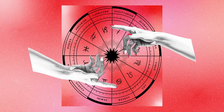 two hands reaching over zodiac wheel