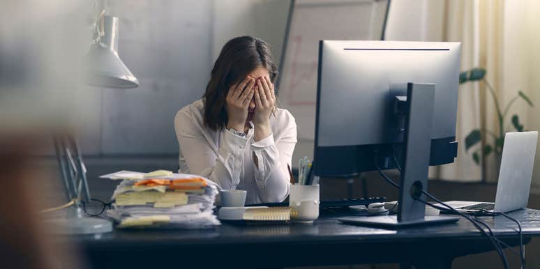 Woman stressed out at soul-sucking job
