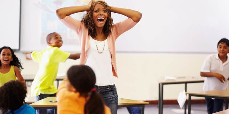 teacher overwhelmed by disorderly classroom