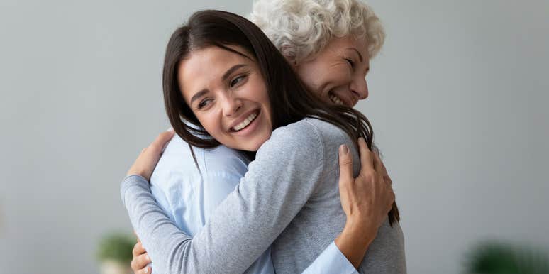 Woman showing affection to her parent