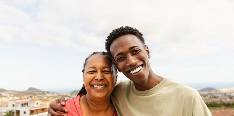 A mother celebrating victories with her autistic son 