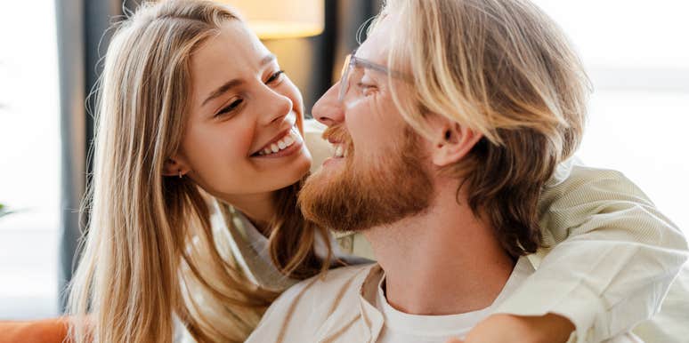 truly in love couple smiling at each other getting close