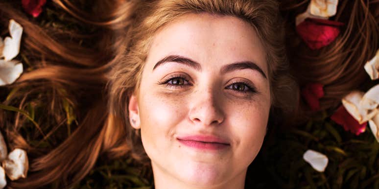 Woman increasing her odds of attracting the right partner. 
