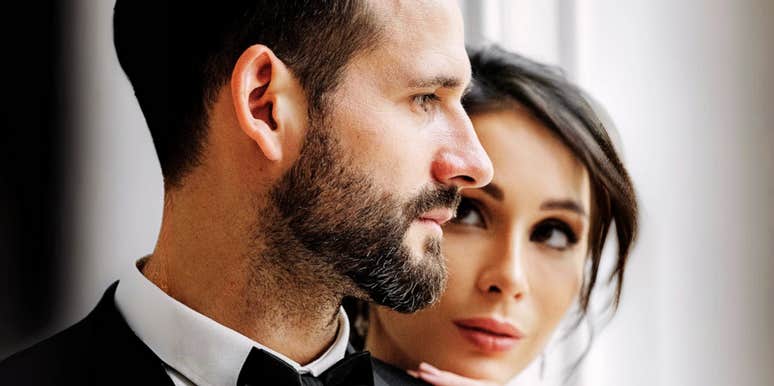 Groom wondering if he shouldn't get married, bride looking, thinking he's a great spouse