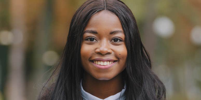 woman smiling looking forward to a more beautiful life