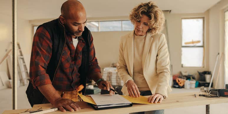 Mom reviewing plans to renovate house with a new gym instead of giving kids their own rooms