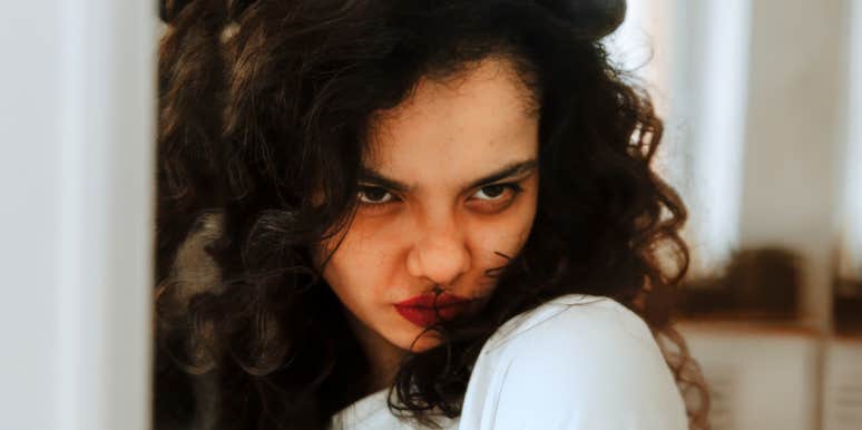 Woman trying to manage anger without hurting the person she loves.