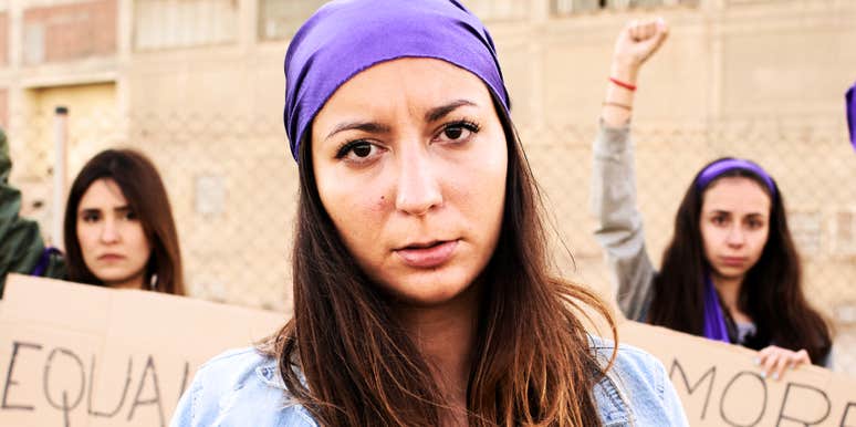 Feminist woman protesting. 
