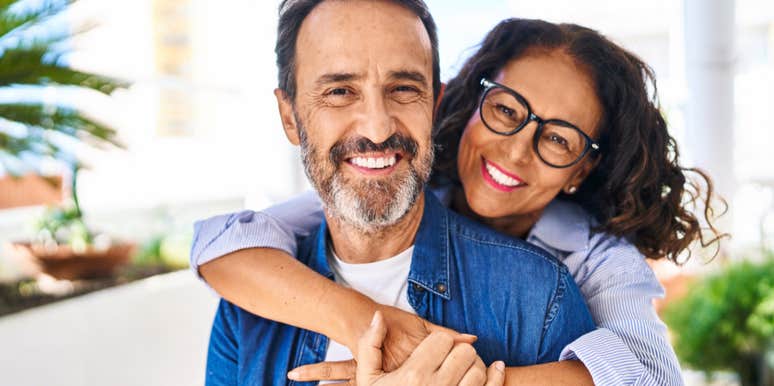 happy couple woman hugging man smiling