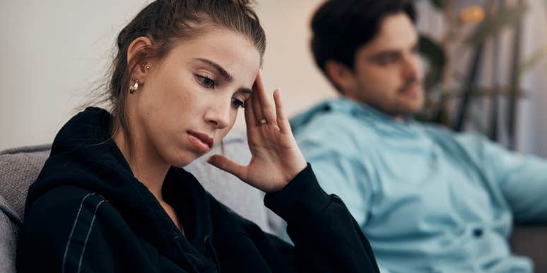 unhappy woman realizing shes not safe in her relationship