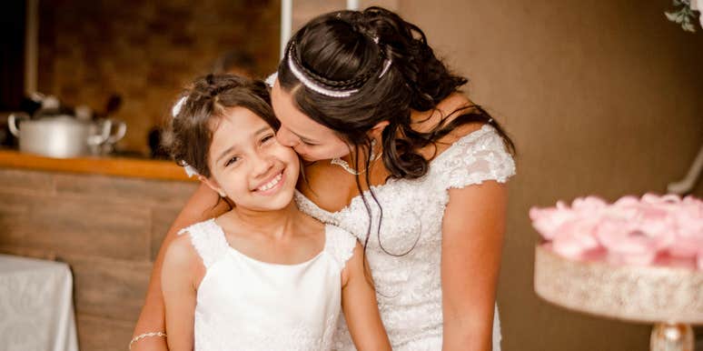 newly married mom and her autistic daughter at wedding