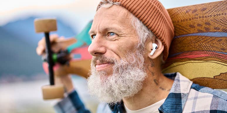 man with skateboard who was raised with old-school values