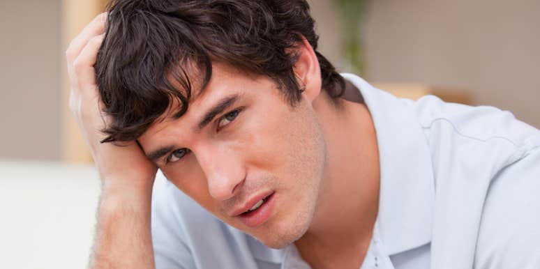 Man feeing sad after his teen brother called him a loser