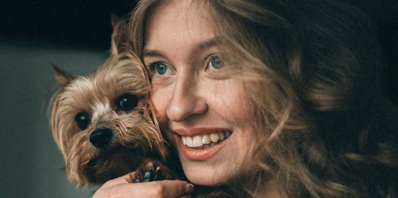 Woman treats pet like royalty.