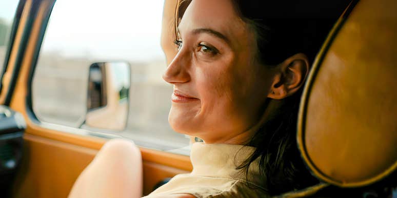 Woman being driven to airport. 