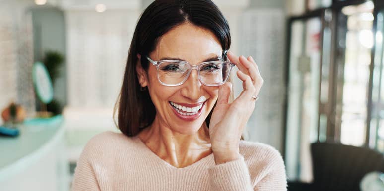 classy woman smiling in her home