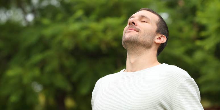 man happy being off of smartphone