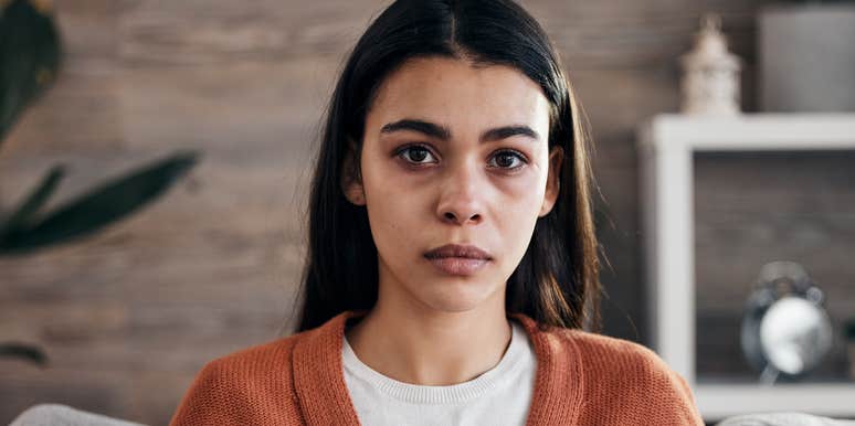 miserable woman not wanting to admit her sadness