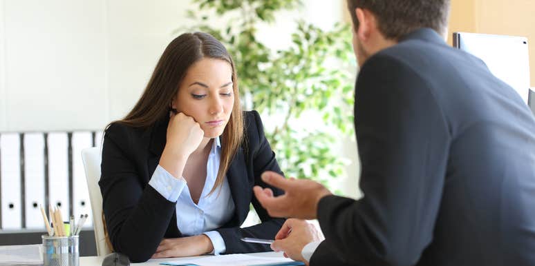 woman getting laughed at in interview