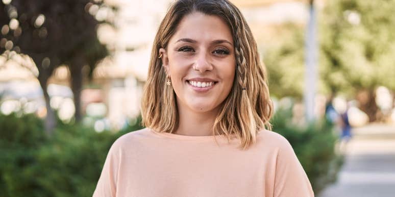 woman with high iq smiling outside