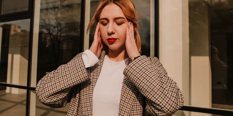 woman realizing she's making herself less intelligent