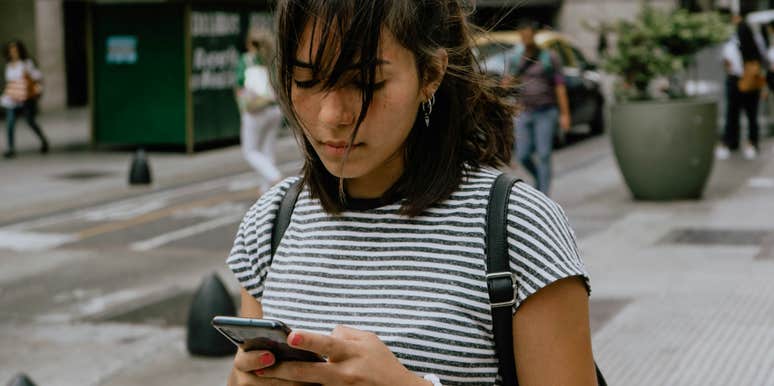 woman using noble mobile company pay you use phone less