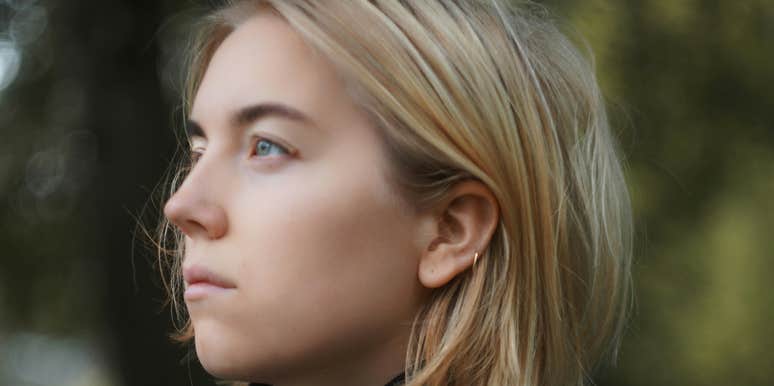 Anxious woman overthinks in relationship.