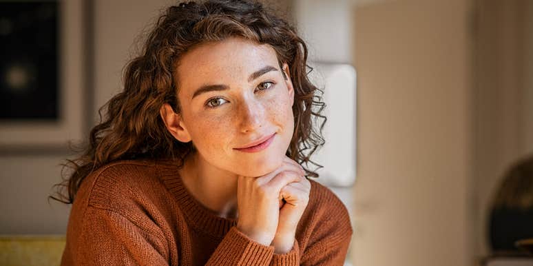 woman thinking about her guilty pleasure