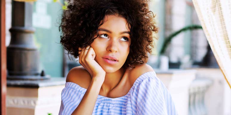 Woman signaling she is not interested. 