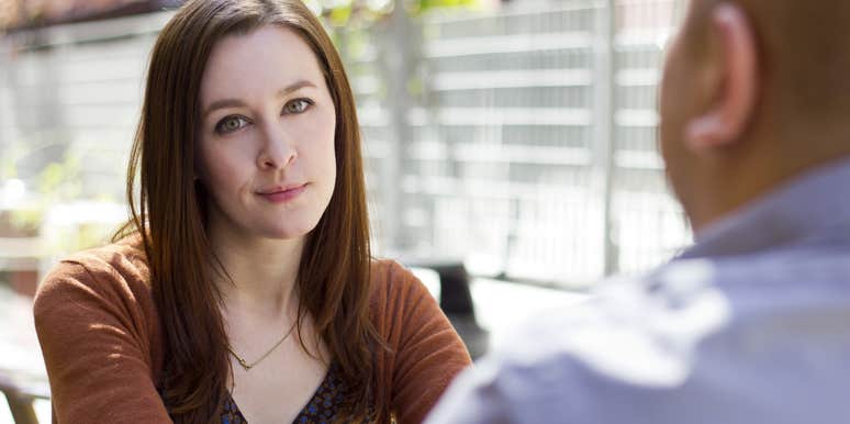 woman who doesnt respect her husband ignoring him during dinner