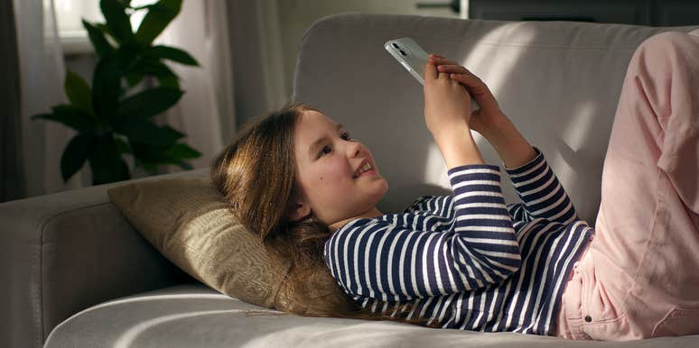young girl on smartphone