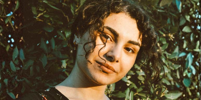 Hopeful person who is staying grounded and real when the world feels awful.