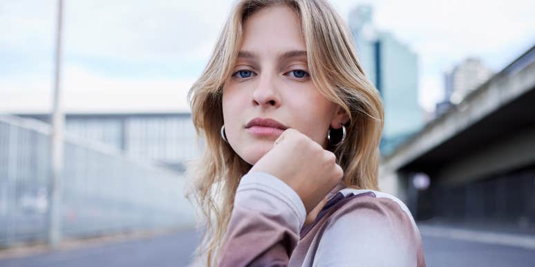young gen z woman thinking