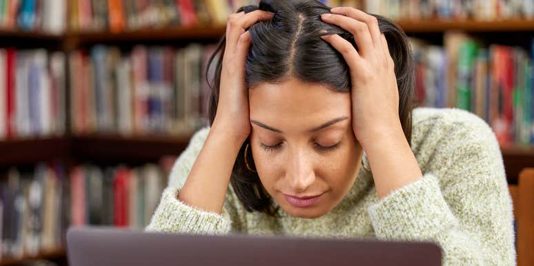woman distracted while working