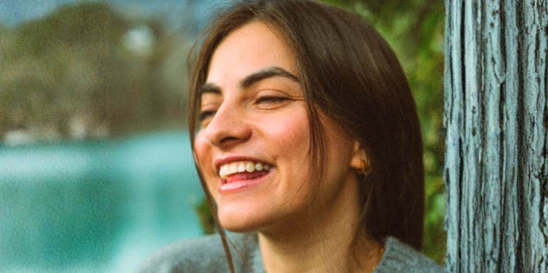 Woman declaring she was going to be happy, with a painful life long condition.