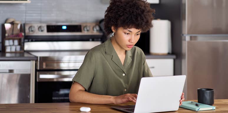 young woman working on laptop