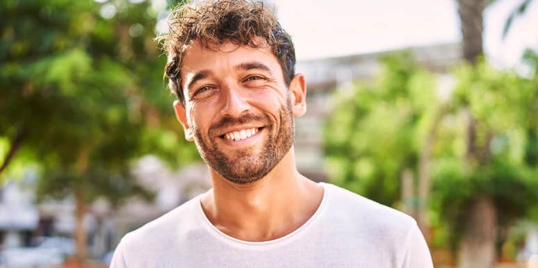 Attractive confident man with calm, focused expression representing emotional maturity, strength, and the loving behaviors of real men who know how to cherish and respect good women.