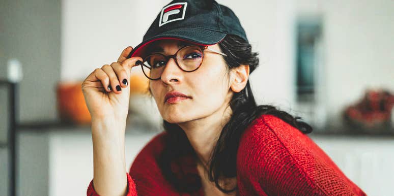 Strong, confident woman walking away showing the art of knowing your worth and lessons learned from no longer choosing disappointing men.