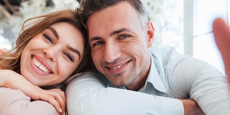 happy couple smiling for a selfie
