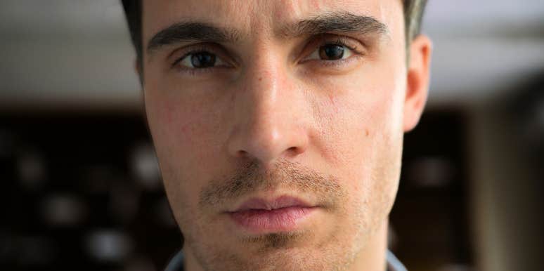 Cold intense person with an unsettling expression showing the subtle warning signs when someone crosses the line from narcissist to sociopath.