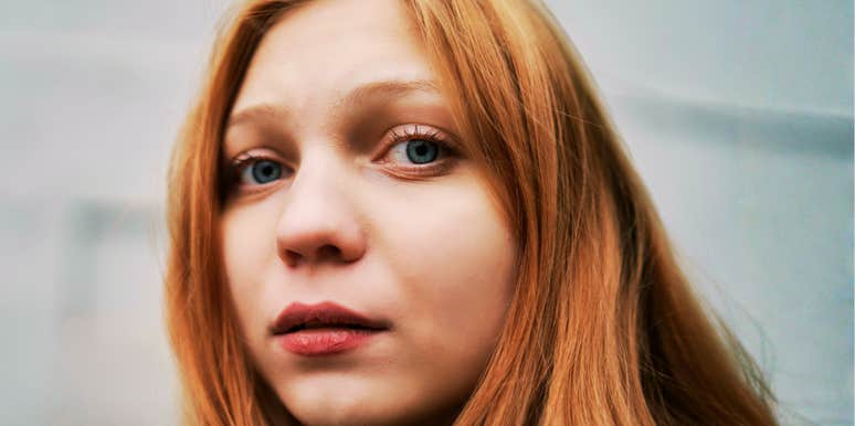 Sad woman with a pained expression, reflecting the emotional reasons people keep giving their partners one more chance.