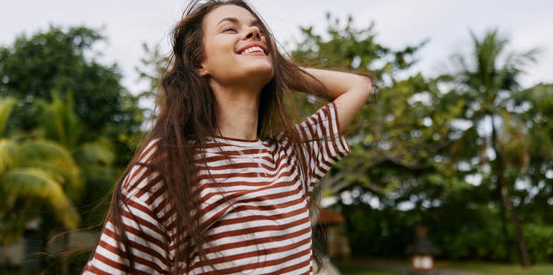 woman who loves taking pictures enjoying life