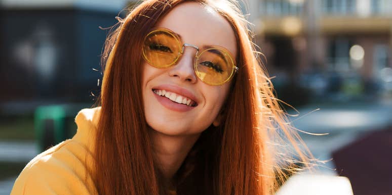 smiling young woman who thrives in chaos