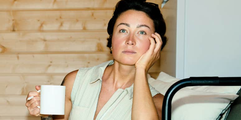 Stressed woman who is zoning out.