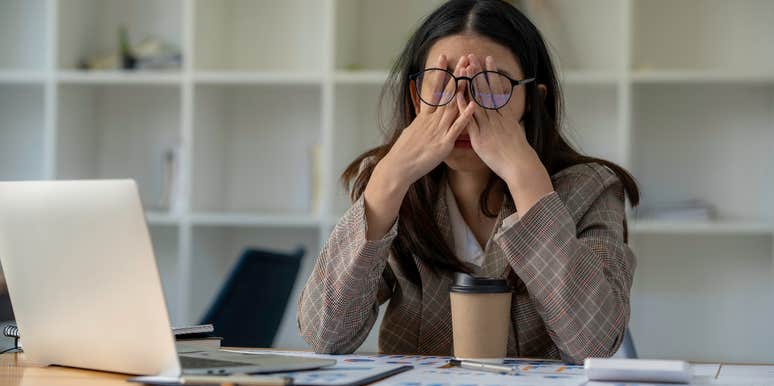 woman feeling tired at work