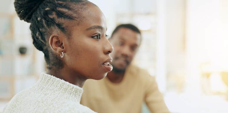 unhappy woman who doesnt like her life anymore sitting with husband