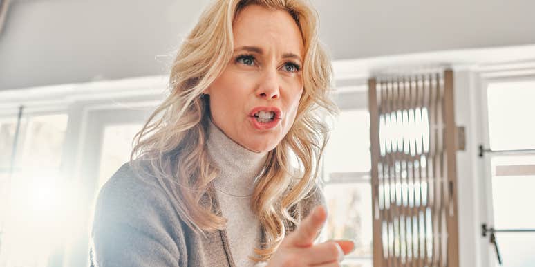 angry mother scolding her adult children