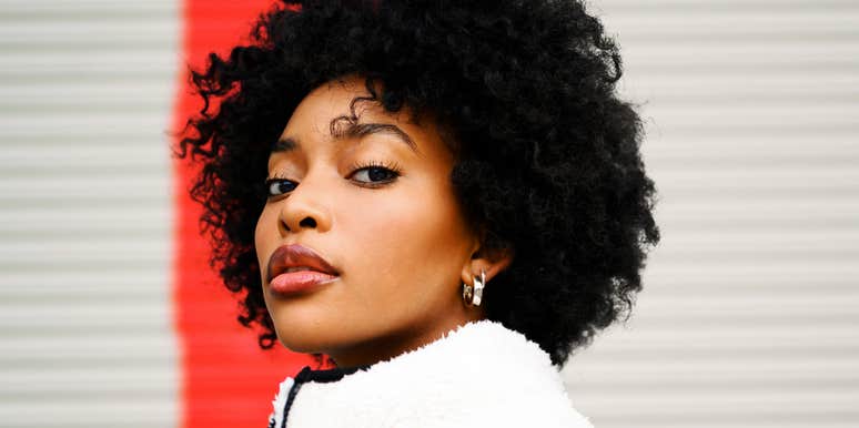 Confident woman staying grounded during intense life changes, illustrating simple ways to adapt when handling hard change gets overwhelming